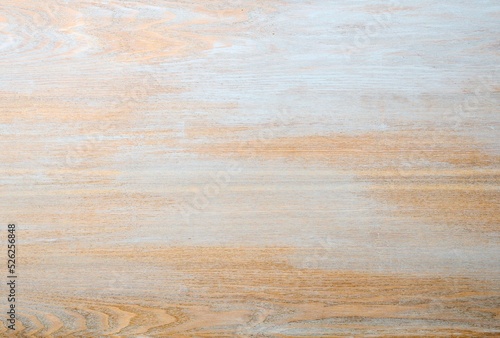 Plain wooden surface of a natural wood plank - top view.