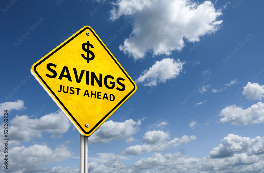 Savings ahead with dollar symbol on traffic road sign Savings ahead with dollar symbol on traffic road sign