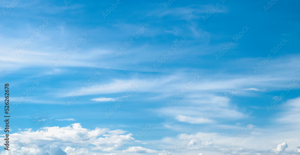 Sky with fluffy white cloudscape texture. Wide blue sky nature background, horizontal Sky with fluffy white cloudscape texture. Wide blue sky nature background, horizontal