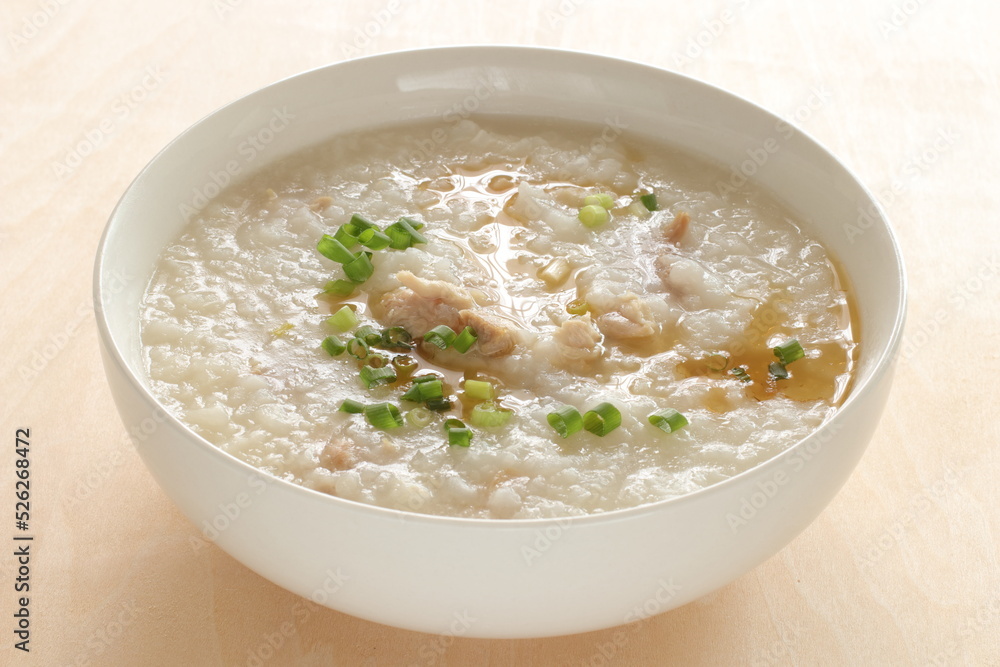 Chinese food, pork congee with sesame oil and spring onion Chinese food, pork congee with sesame oil and spring onion