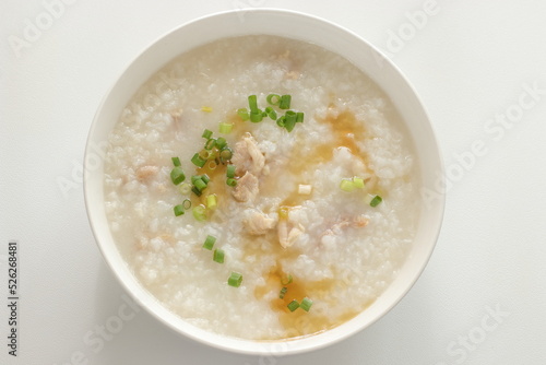 Chinese food, pork congee with sesame oil and spring onion