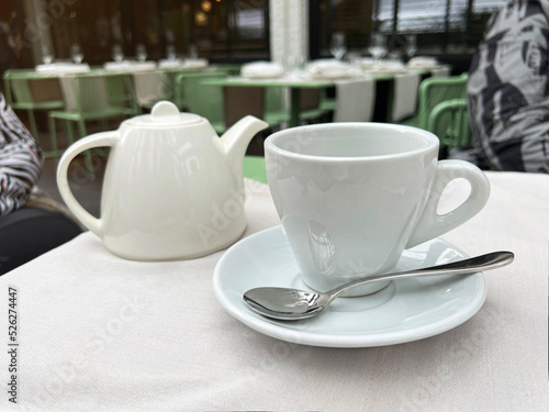 tea cup with teapot in a restaurant