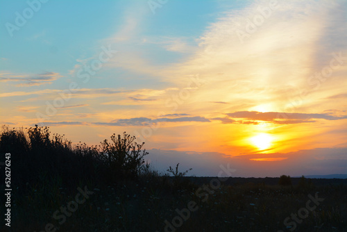 Beautiful landscape with sky lit by sunset