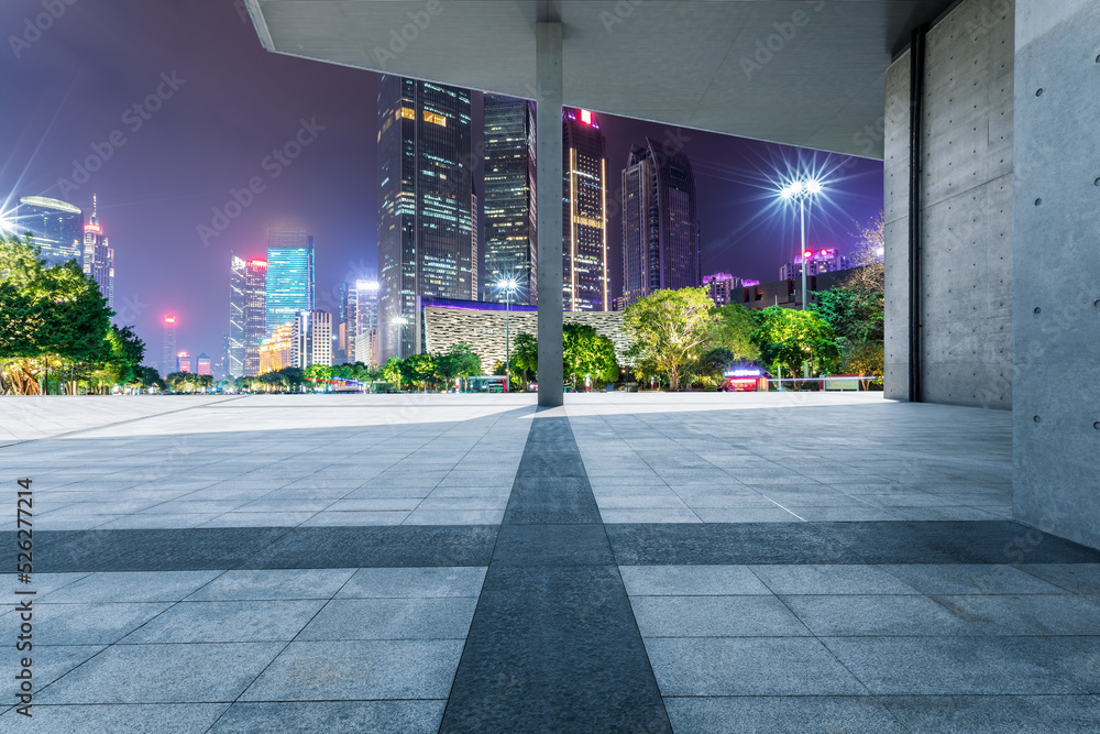 Panoramic skyline and modern commercial buildings with empty square in Guangzhou, China.