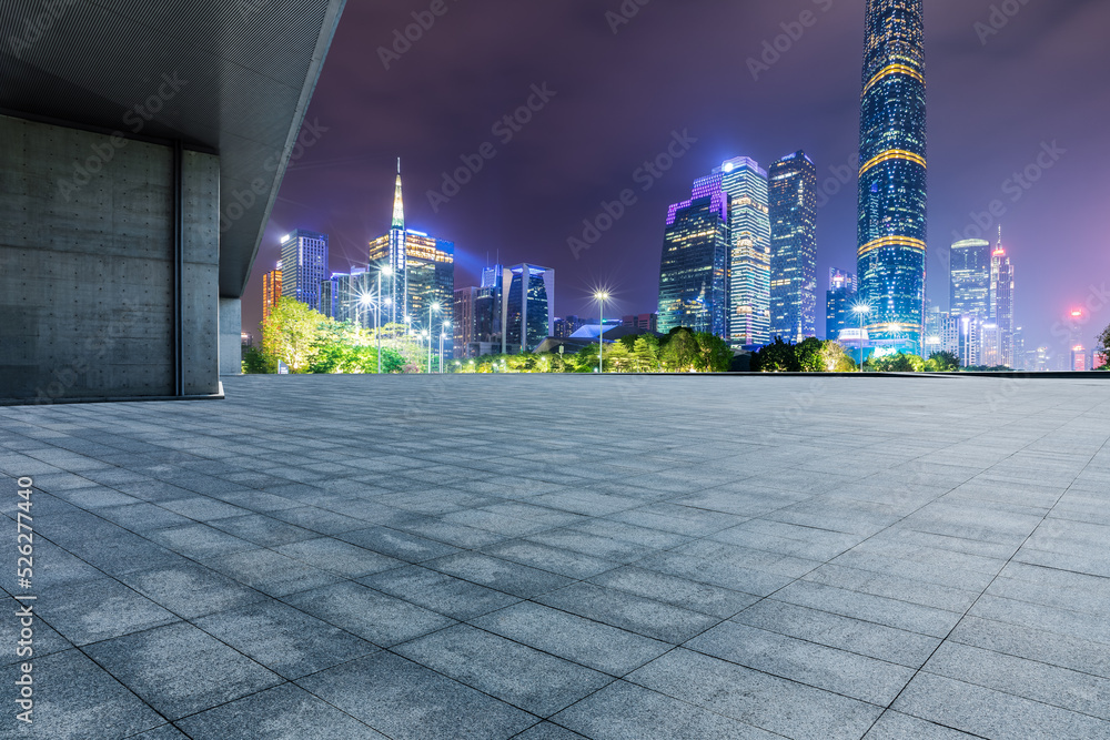 Panoramic skyline and modern commercial buildings with empty square in Guangzhou, China.