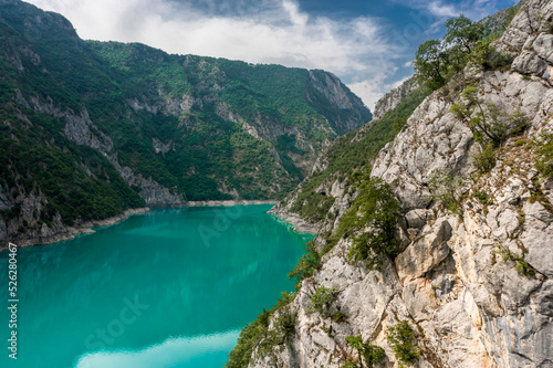 Piva Lake - Amazing Mountain View in Montenegro / Alps Landscape - turquoise blue water on Balkan between rocks