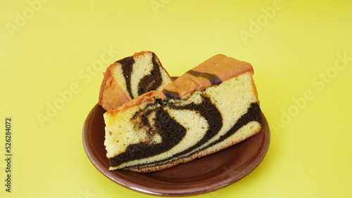 A small plate of delicious chocolate sponge bread photo