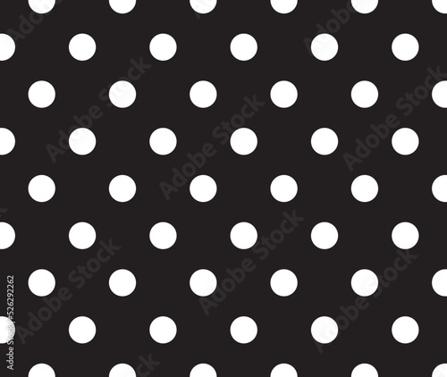 White peas on a black background. Semaless pattern with white circles. Polka dots