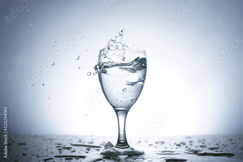 This is photo of water scattered in glass.
