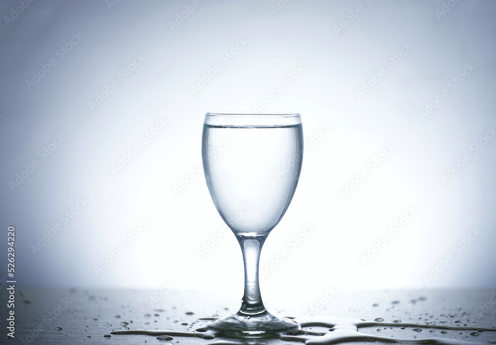 Obraz premium Photo of pouring water into a glass of water