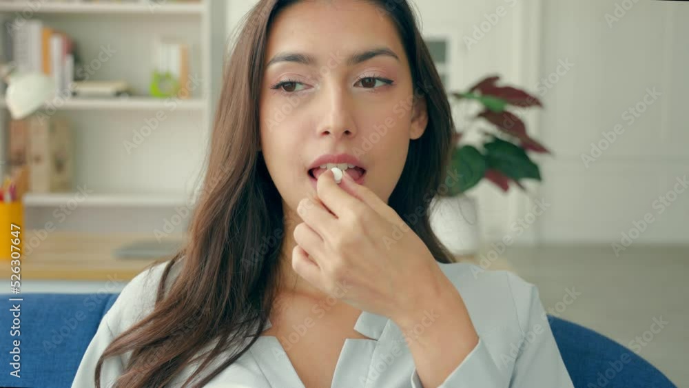 Woman take medicine and Drinking a Glass of Water. Woman take medicine and Drinking a Glass of Water.