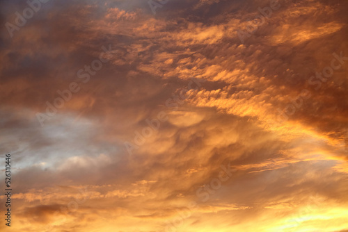 Beautiful sunset sky with clouds. Amazing summer sunset background