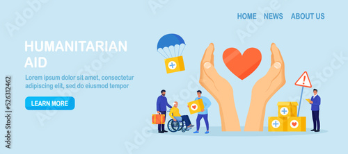 Humanitarian aid. Social worker distributing food, medical supplies to needy people. Volunteering, donation, humanitarian relief. Volunteers giving help boxes to refugees Government assistance to poor