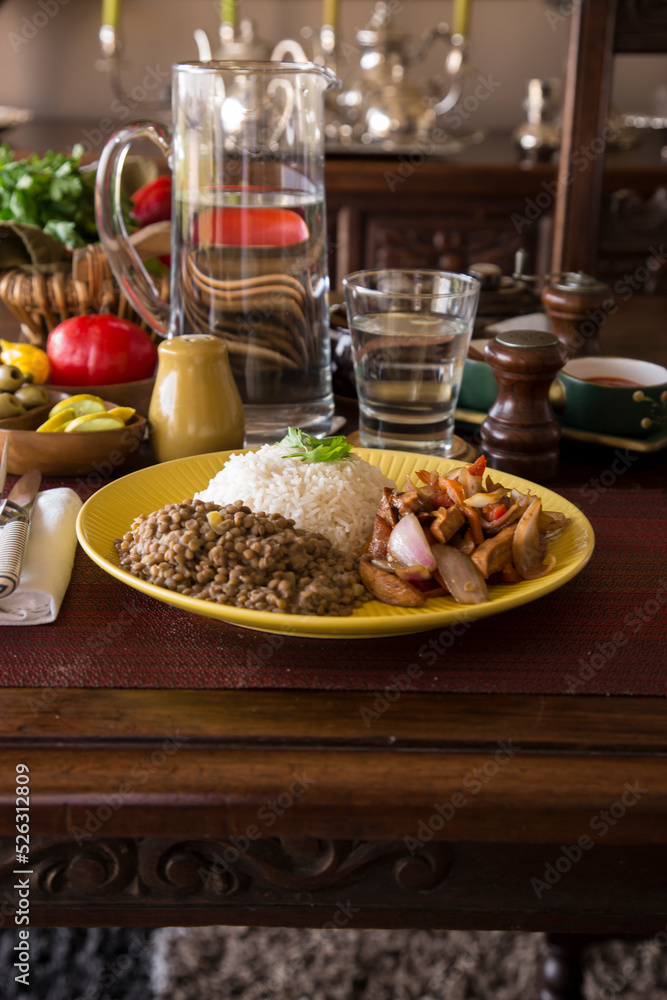Lentils sstew with sauted chicken Peruvian gourmet restaurant food