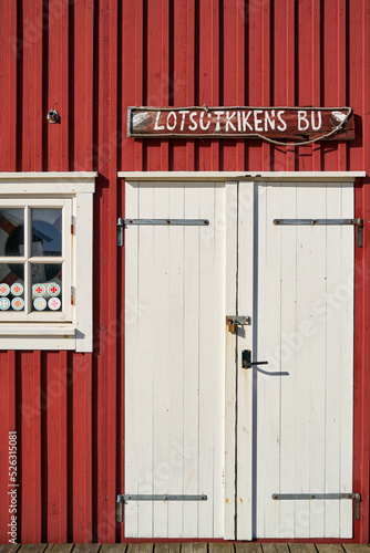 door of a typical red fisherman's house in sweden photo