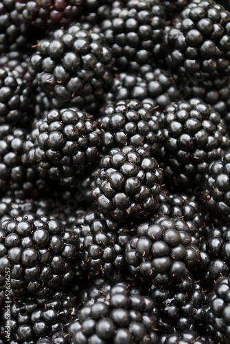 Close up of ripe blackberries. Texture background from blackberries. Natural berry background