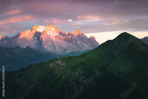Sunrise over marmolada peak in italian dolomites. photo