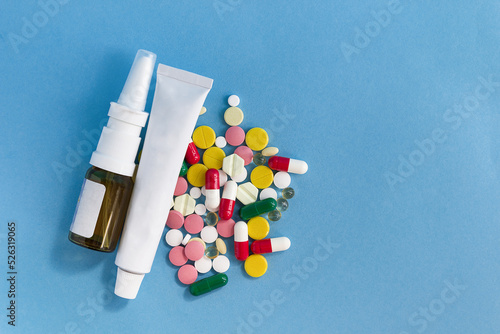 Various medicines on a blue background