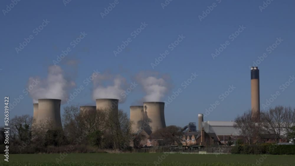 Coal power station still in use in England. Carbon intense energy production Hull with chimney and smoke UK 4K Coal power station still in use in England. Carbon intense energy production Hull with chimney and smoke UK 4K