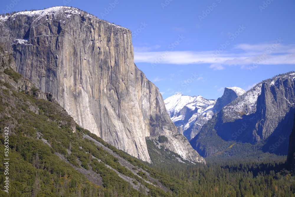 Snow topped mountains in Yosemite with valley view