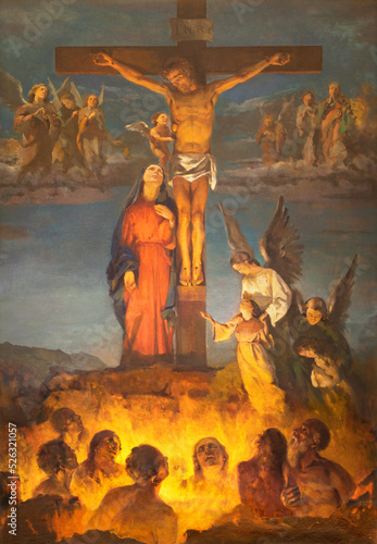 BIELLA, ITALY - JULY 15, 2022: The painting of Crucifixion and soul in the purgatory in the church Chiesa di San Casiano (1954).