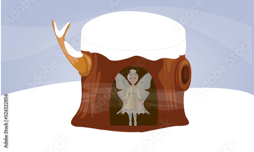 Winter fairy inside a snow-covered hollow tree stump in the cold winter air 