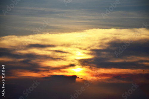Fototapeta Naklejka Na Ścianę i Meble -  Aerial view landscape cloudscape of blue sky and beautiful clouds with twilight ray lighting of sunlight in dusk evening time at nonthaburi countryside rural of bangkok city in Thailand