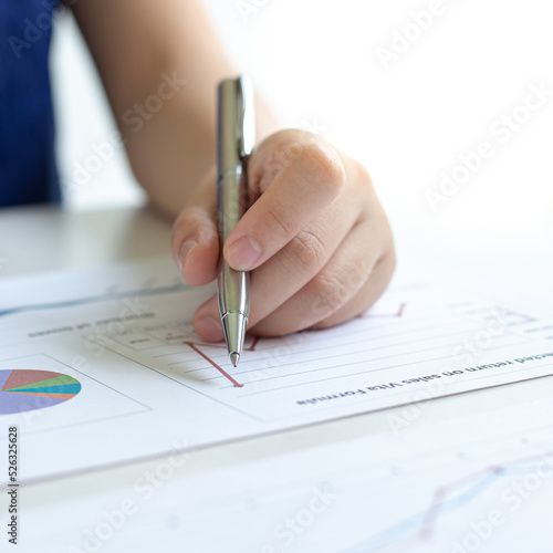 Head of marketing has analyzed the financial income graph of the company in order to develop the structure of the company to be ready for the economy in the future. Financial results analysis concept.