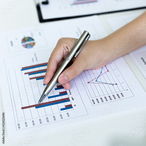 Head of marketing has analyzed the financial income graph of the company in order to develop the structure of the company to be ready for the economy in the future. Financial results analysis concept.