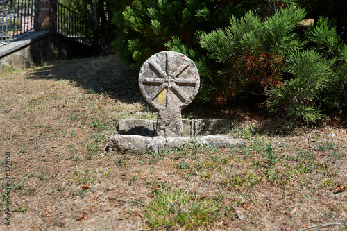 Obraz na plátně round funerary stele with an eight-pointed star and a cross in the center
