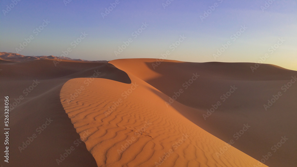 sand dune under a sunset in the Algerian Sahara