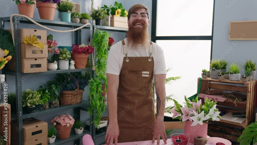 Young redhead man florist smiling confident standing at flower shop Young redhead man florist smiling confident standing at flower shop