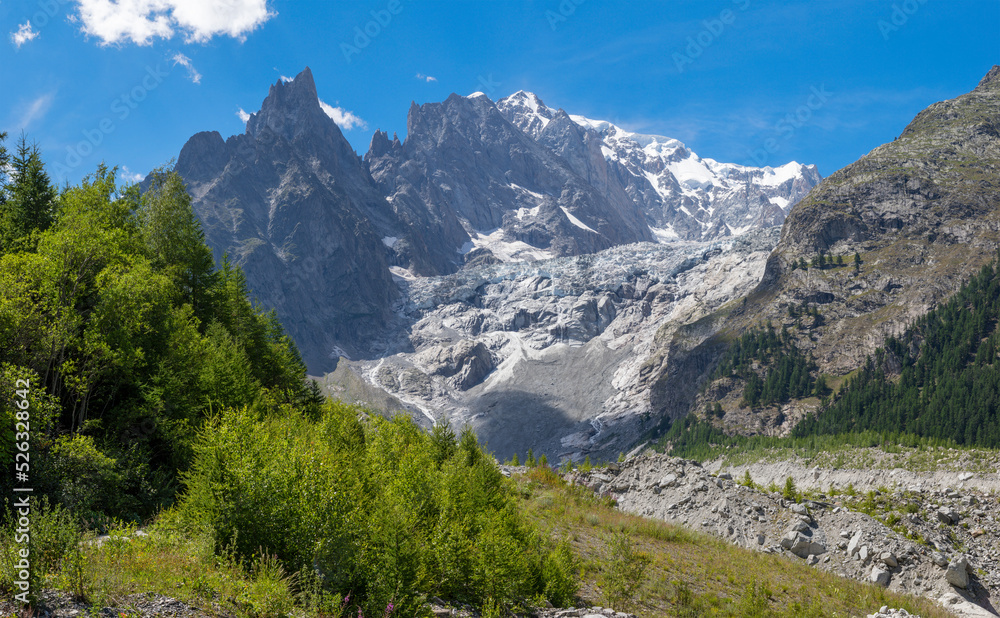 The  Mont Blanc massif and Brenva glacier from Val Ferret valley - Entreves in Italy.