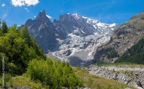 The Mont Blanc massif and Brenva glacier from Val Ferret valley - Entreves in Italy.