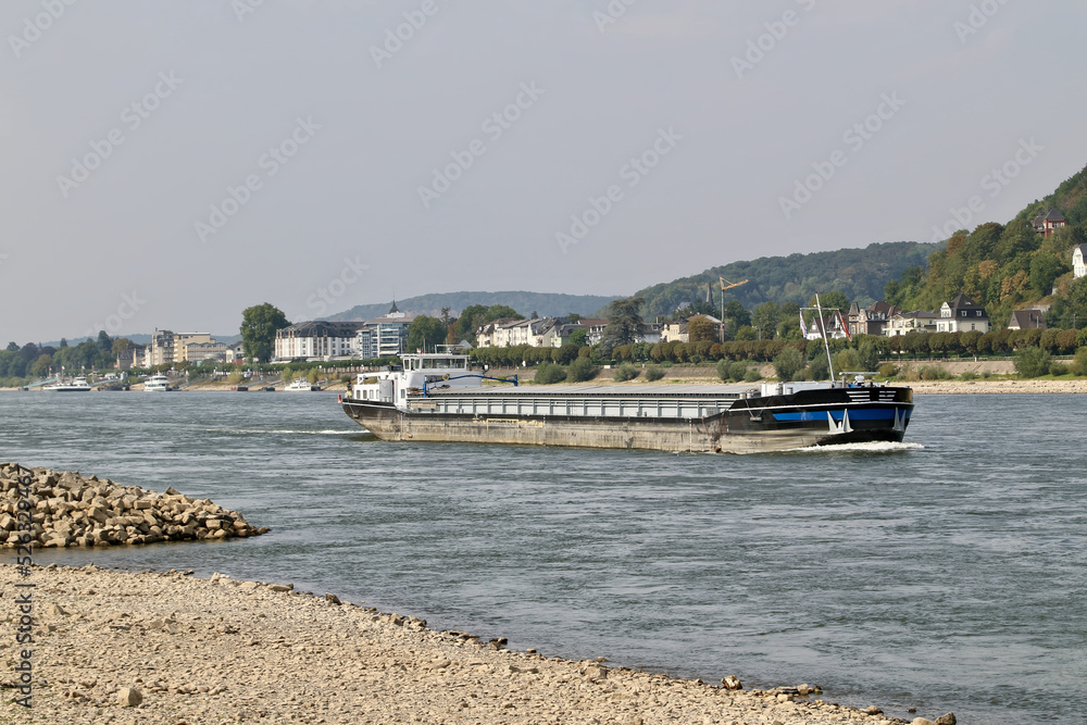 Cargo ship on the river with low water level
