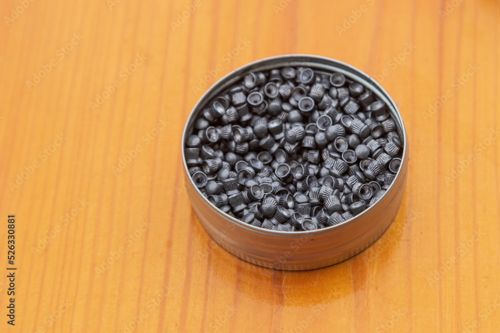 Diabolka's airgun ammunition is in a tin box on the table. Diabolka's airgun ammunition is in a tin box on the table.