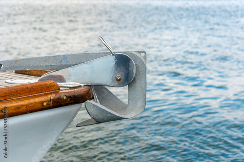 Bow of a sailing boat with an anchor