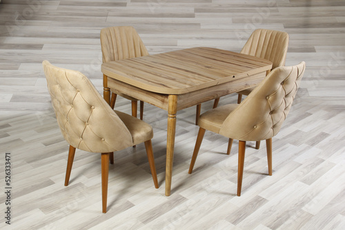 beige color wooden Table and nubuck material chair stock photo