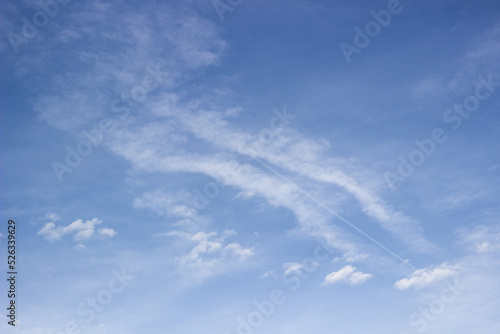 Beautiful sky with white clouds background. Light cumulus clouds in the blue sky © sanjagrujic