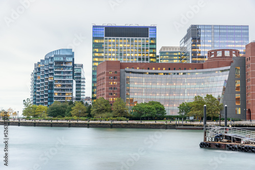 Waterfront apartment and office buildings on a cloudy autumn evening