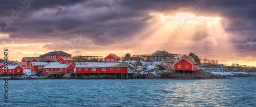 фотография Norwegian fishing village and sea coast at sunset
