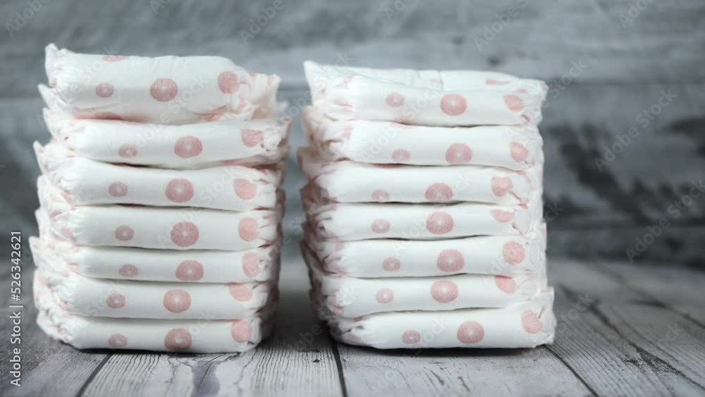stack of baby diaper on table, stack of baby diaper on table,