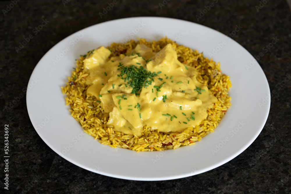 fresh cooking at home - sliced turkey with curry rice and curry cream sauce
