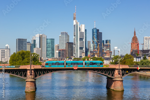 Frankfurt skyline with Main river and tram on Ignatz Bubis Bridge travel traveling in Germany photo