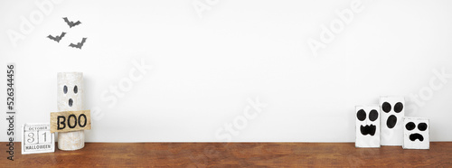 Obraz na płótnie Halloween shelf decor with copy space against a white wall banner background