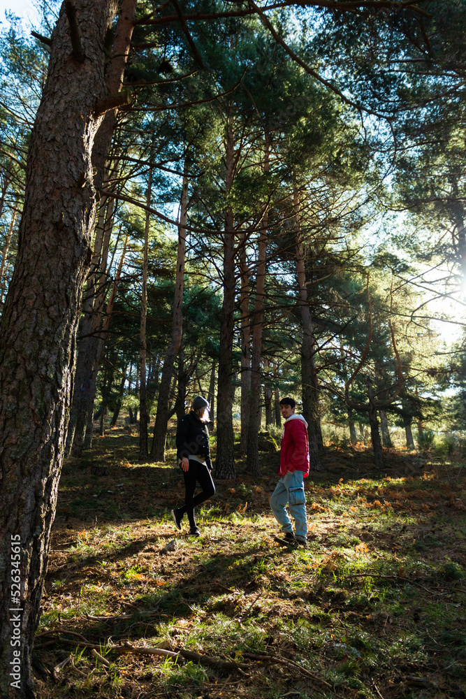 Two friends standing in the middle of the nature Two friends standing in the middle of the nature