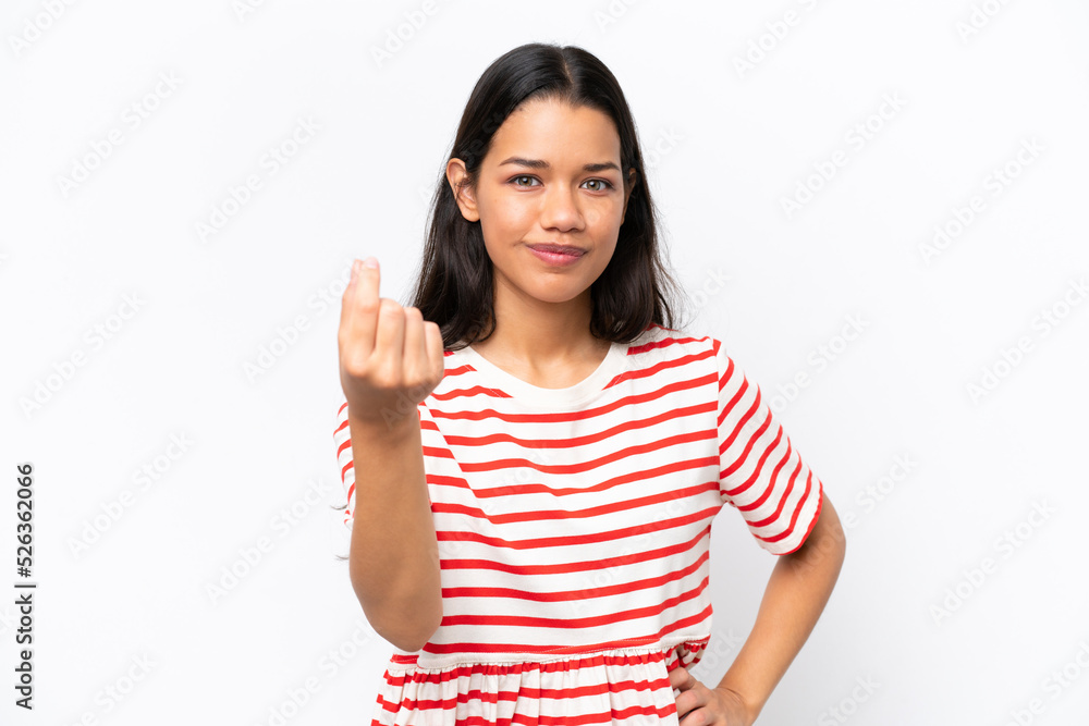 Young Colombian woman isolated on white background making Italian gesture Young Colombian woman isolated on white background making Italian gesture
