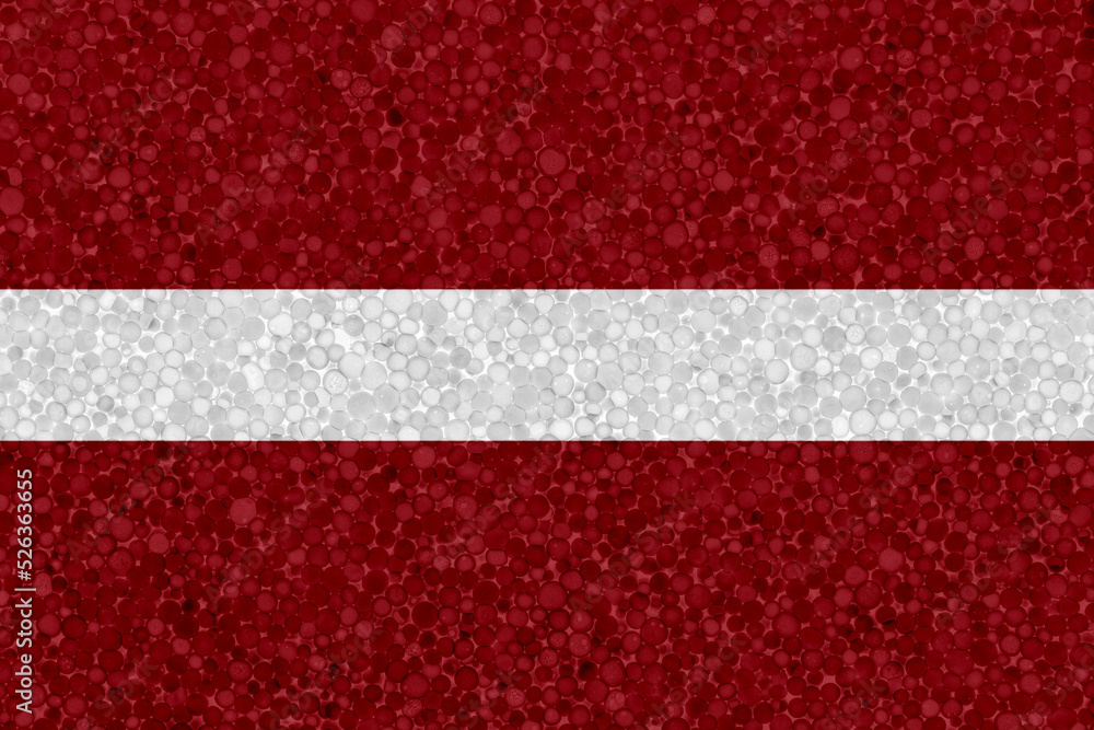 Flag of Latvia on styrofoam texture. national flag painted on the surface of plastic foam Flag of Latvia on styrofoam texture. national flag painted on the surface of plastic foam