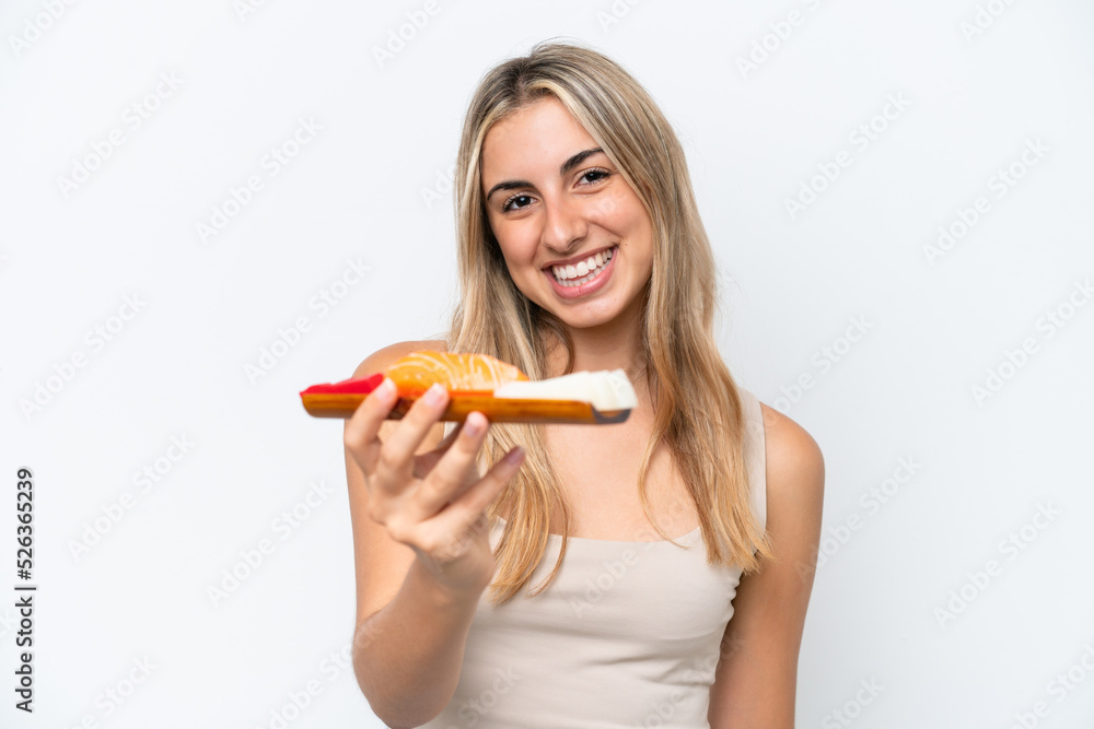 Young caucasian woman holding sashimi isolated on white background with happy expression Young caucasian woman holding sashimi isolated on white background with happy expression