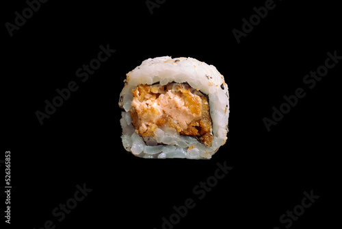 brazilian japanese food isolated on black background rice sushi and toasted salmon.